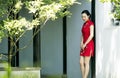 Chinese cheongsam model in Chinese classical garden